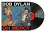 Text: "BOB DYLAN OH MERCY". Illustration: Zwei Menschen tanzen. Rechts daneben eine schwarze Vinyl-Schallplatte.