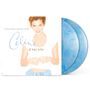 "Falling Into You", Celine Dion. Cover mit Frau in weißem Shirt und blauen Vinyl-Platten.