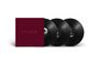 Auf einem weinroten Cover steht "THE FAITH TOUR". Drei schwarze Schallplatten erscheinen dahinter.