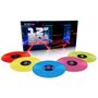 Text: "12'' 80s, Volume Three." Fünf bunte Vinyl-Schallplatten in Rot, Gelb, Blau und Pink vor einer Box.