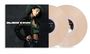 Text: "Alicia Keys, songs in A minor." Frau in grünem Hut und gestreiftem Oberteil. Zwei transparente Vinyl-Schallplatten.