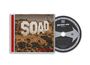 Texte: "SOAD", "TOXICITY", "SYSTEM OF A DOWN". CD-Hülle zeigt große weiße Buchstaben auf einem Hügel ähnlich dem Hollywood-Schild.