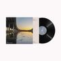 Es ist eine Schallplatte. Links im Cover ein Autobahnbrückenfoto bei Sonnenuntergang, der Text beschreibt Musikstücke.