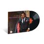"el chico", "chico hamilton". Ein Vinyl-Album mit Cover eines Mannes im Anzug. Rechts die schwarze Schallplatte.