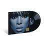 "Kelly Rowland Here I Am" steht auf einem Albumcover mit einer Nahaufnahme des Gesichts einer Frau in Blautönen.