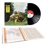 Covertext: "CHILD SONG, HENRY LOWTHER BAND". Schallplatte, zwei sitzende Personen im Gras. Unten Texte und Notizen in einem Heft.