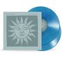 "tears for fears", "the seeds of love", zwei blaue Vinyl-Schallplatten, Illustration eines stilisierten Sonnengesichts.