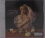 Texte: "CARLY RAE JEPSEN", "the Loneliest Time", "Parental Advisory Explicit Content". Frau in durchsichtigem Kleid an einem Tisch.