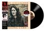 "50th Anniversary Remaster", "Rory Gallagher - Calling Card". Foto eines Mannes mit langen Haaren vor einer Backsteinmauer.
