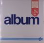 "album" in blauer Schrift; rechts oben rotes Etikett; unten "public image ltd" und kleines "PiL"-Logo.