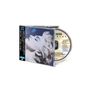CD-Hülle mit "MADONNA BLUE", seitlich japanischer Text. Schwarze-and-weißes Portrait einer Person mit zurückgebeugtem Kopf.