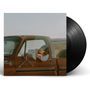 Der Text „10“ und „Sticker“ auf einem Pickup-Truck. Eine Person lehnt aus dem Fenster, es handelt sich um ein Albumcover.