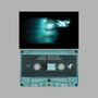 Text: "Lost Weekend Phoebe Bridgers Side A". Eine transparente Audiokassette unter einem unscharfen, blaugrünen Gesicht.