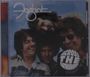 "Foghat" und "ACROSS THE AIRWAVES, OCTOBER 9, 1981". Vier lächelnde Männer mit Sonnenbrillen vor einem Himmelshintergrund.