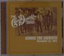 "THE CHARLIE DANIELS BAND. ACROSS THE AIRWAVES. November 22, 1985." Fünf Männer in Cowboy-Outfits, sepiafarbene Töne.