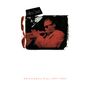 Miles Davis. The Columbia Years 1955-1985. Ein Musiker spielt Trompete, in Rot- und Schwarztönen gehalten.