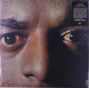 Texte: "NANA / amazônas", "LIMITED VINYL". Nahaufnahme eines Gesichts mit fokussiertem Blick, Wassertropfen sichtbar.