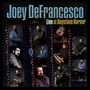 „Joey DeFrancesco Live at Keystone Korner“ steht geschrieben. Verschiedene Fotos eines Mannes mit Saxofon und Keyboard.