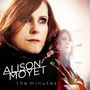 Aufschrift „ALISON MOYET the minutes“. Eine Frau mit rotem Haar schaut selbstsicher, doppelt dargestellt.