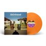 „Skinhead”, „It's a beautiful day, what a beautiful day.” Ein Plattencover mit oranger Vinyl und Hauskulisse.