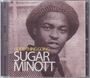 "GOOD THING GOING SUGAR MINOTT". Ein schwarz-weißes Porträt zeigt einen Mann mit Hut, der ruhig in die Kamera schaut.