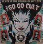 "BLACK IS THE COLOUR OF MY LOVE" oben; "THE GO GO CULT" mittig. Illustration zeigt eine mystische Figur mit Spielkarten.