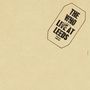 "The Who Live at Leeds" in schwarzem Text auf beigem Hintergrund, in einem schräg stehenden sechseckigen Rahmen.