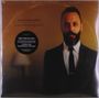 Texte: "Justin Furstenfeld", "Songs From An Open Book", "FIRST TIME ON VINYL". Ein Mann im Anzug mit Bart vor goldenem Hintergrund.