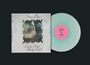 Text: "Daniel Loves Mandy Forever", "Grouper - Paradise Valley", "Thieves of the Stream", "Swimming Crush".  
Links ein Plattencover mit unscharfem Foto, rechts eine mintgrüne Vinylplatte mit rosa Label.