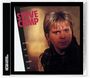 "STEVE CAMP" in roter Schrift, "SHAKE ME TO WAKE ME" vertikal. Ein Mann mit blondem Haar blickt ernst.