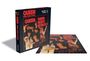 Text: „QUEEN SHEER HEART ATTACK“. Ein Puzzle mit Albumcover-Motiv zeigt vier liegende Personen in dramatischer Beleuchtung.