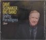 Cover mit den Worten: "DAVE SLONAKER BIG BAND Shifty Paradigms". Ein lächelnder Mann in Anzug und Krawatte. Logo von Origin Records.
