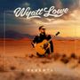 "Wyatt Lowe", "Deserts". Ein Mann steht mit Gitarre in einer Wüstenlandschaft, der Himmel ist dramatisch bewölkt.