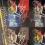 Text: "dead automata", "DECADENCE", "DELUXE EDITION", "GIRL". Eine neonbeleuchtete Frau in verschiedenen Posen.