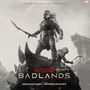 Text: "Predator Badlands." Unter einem Krieger mit Maske, Schwert und einem Kind auf der Schulter, begleitet von einem Wesen.