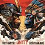 „HEY-SMITH UNITY LESS THAN JAKE“. Zwei Gorillas in Rüstungen schauen sich intensiv an, vor rotem Hintergrund.