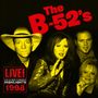 "The B-52's", "LIVE!", "HIGHLIGHTS 1998". Vier Personen gelb getönt, einer trägt Hut, dynamische Pose.