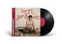 "Songs for Young Lovers" steht in roter Schrift. Eine LP-Hülle zeigt eine Person ohne Hemd mit Tattoos, sitzend auf einem Boden.