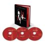 Text: "MIDGE URE Chapters: The Best Of" auf Buch und CDs. Buch zeigt Gesicht, CDs betitelt: SONGS, CONNECTIONS, MUSIC.