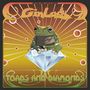 „Volume One: Live in Spain“, „Gin Lady“, „Toads and Diamonds“. Eine Kröte sitzt auf einem großen Diamanten vor strahlenförmigem Hintergrund.