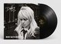 Texte: "Duffy", "ROCKFERRY". Schwarzweiß-Albumcover. Frau mit langen blonden Haaren, im Hintergrund ein Zug.