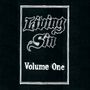 „Living Sin Volume One“ in gotischer Schrift, umrahmt von einem weißen Kasten auf schwarzem Hintergrund.
