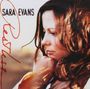 Text: "Sara Evans" in Schwarz, "Restless" in roter Schreibschrift. Eine Frau mit braunen Haaren, nachdenklich zur Seite blickend.