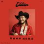 "Eddie 9V" oben, "Down Here" unten. Eine Person mit Cowboyhut und rotem Hemd lächelnd, spielt Gitarre.