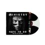 "MINISTRY - HATE TO GO, TAKE OUT OR DELIVERY." Schwarzes Cover mit einem ernsten Gesicht und Sonnenbrille, darüber Vinyl.