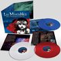 „Les Misérables: The 40th Anniversary All-Star Cast“, drei bunte Schallplatten, ein Cover mit Kind und rotem Schal.
