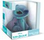 Eine Sparbüchse mit der Figur Stitch. Verpackung mit "Disney Lilo & Stitch" und "Money Bank Tirelire" Beschriftung.