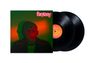Text: "fantasy" oben in Neonrosa, "M83 FANTASY" auf Schallplatte. Porträt mit surrealem Gesicht und bunten Lichteffekten.