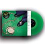 „Living the Dream“, „Howlin' Jaws“, „Limited Edition“. Grünes Vinyl, schwarze Schuhe, Kette auf grünem Hintergrund.
