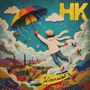 Texte: "HK", "Le Cœur au Vent".  
Illustration: Person mit buntem Regenschirm über Stadt schwebend.